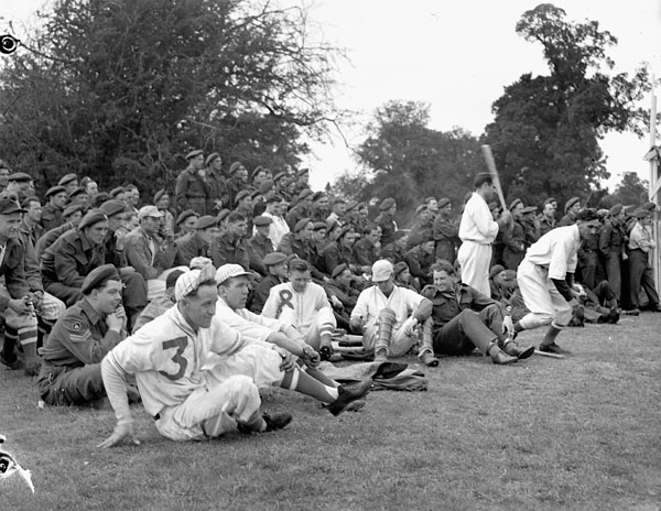Baseball team of No.1 Canadian Corps Ordnance Depot which was playing the team of the 101st Squadron, United States Army Air Forces,Godalming, England, 14 June 1945.