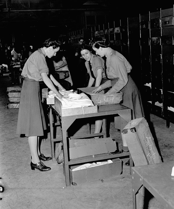 Personnel of the Canadian Women's Army Corps (C.W.A.C.) at the Surrey County Council Central Laundry, Carshalton, England, 18 August 1943.
