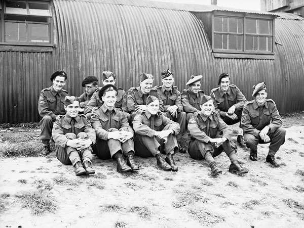 Candidates from the Canadian Army Overseas who completed their British parachute training at No. 1 Parachute Training School, Royal Air Force (R.A.F), at Ringway in anticipation of service with the First Special Service Force at a Non-Effective Transit Depot in England, 1942.