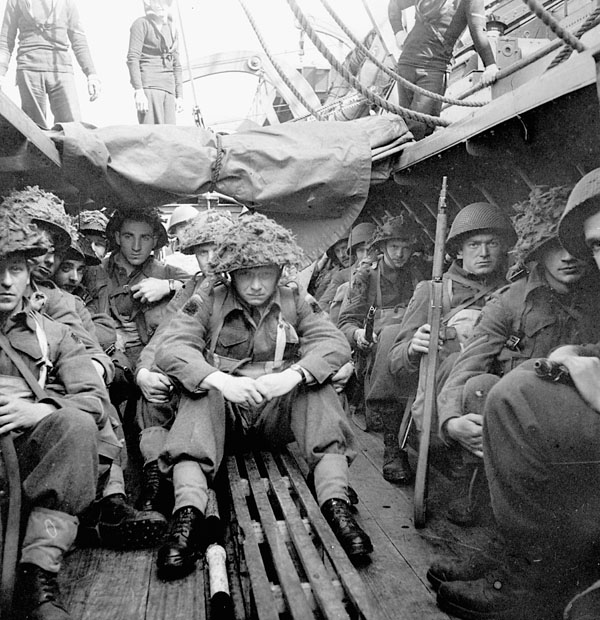 Soldiers of the 7th Canadian Infantry Brigade in a Landing Craft Assault (LCA) of the Landing Ship Infantry (Medium) QUEEN EMMA during Exercise Fabius, England, 29 April - 15 May 1944.