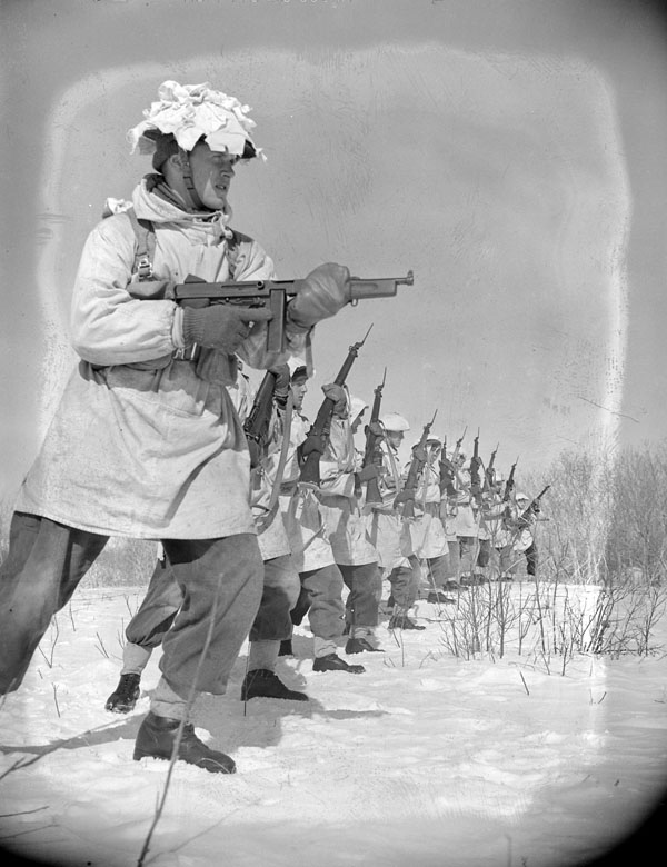 Canadian parachute-qualified personnel who will be posted to the 1st Canadian Parachute Battalion undertaking winter infantry training at A-35 Canadian Parachute Training Centre (Canadian Army Training Centres and Schools), Camp Shilo, Manitoba, Canada, 20 March 1945.