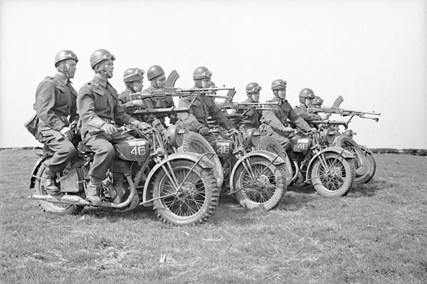 Four motorcycle Bren gun teams of the Royal Montreal Regiment taking part in a training exercise at Petworth Camp, England, 28 April 1942.
